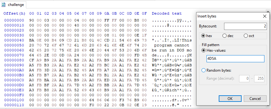 Figure 2: Hex view showing the insertion of the `MZ` DOS header magic bytes.